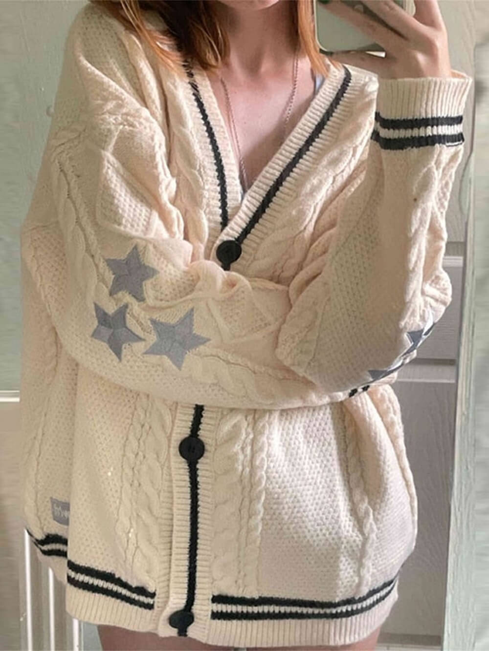 Cardigan bordado com estrela solta